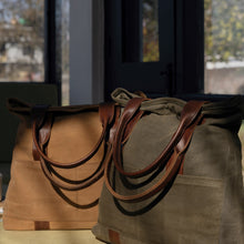 Load image into Gallery viewer, Two stylish tote bags in brown and olive colors with leather handles, perfect for everyday use